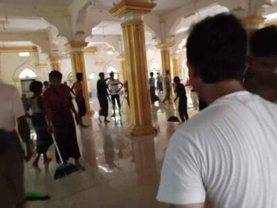 Rohingyas cleaning the mosque when Myanmar army allowed reopening it in April 2024 (Image: ANA)